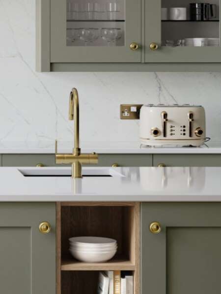 Sage green kitchen with marble top